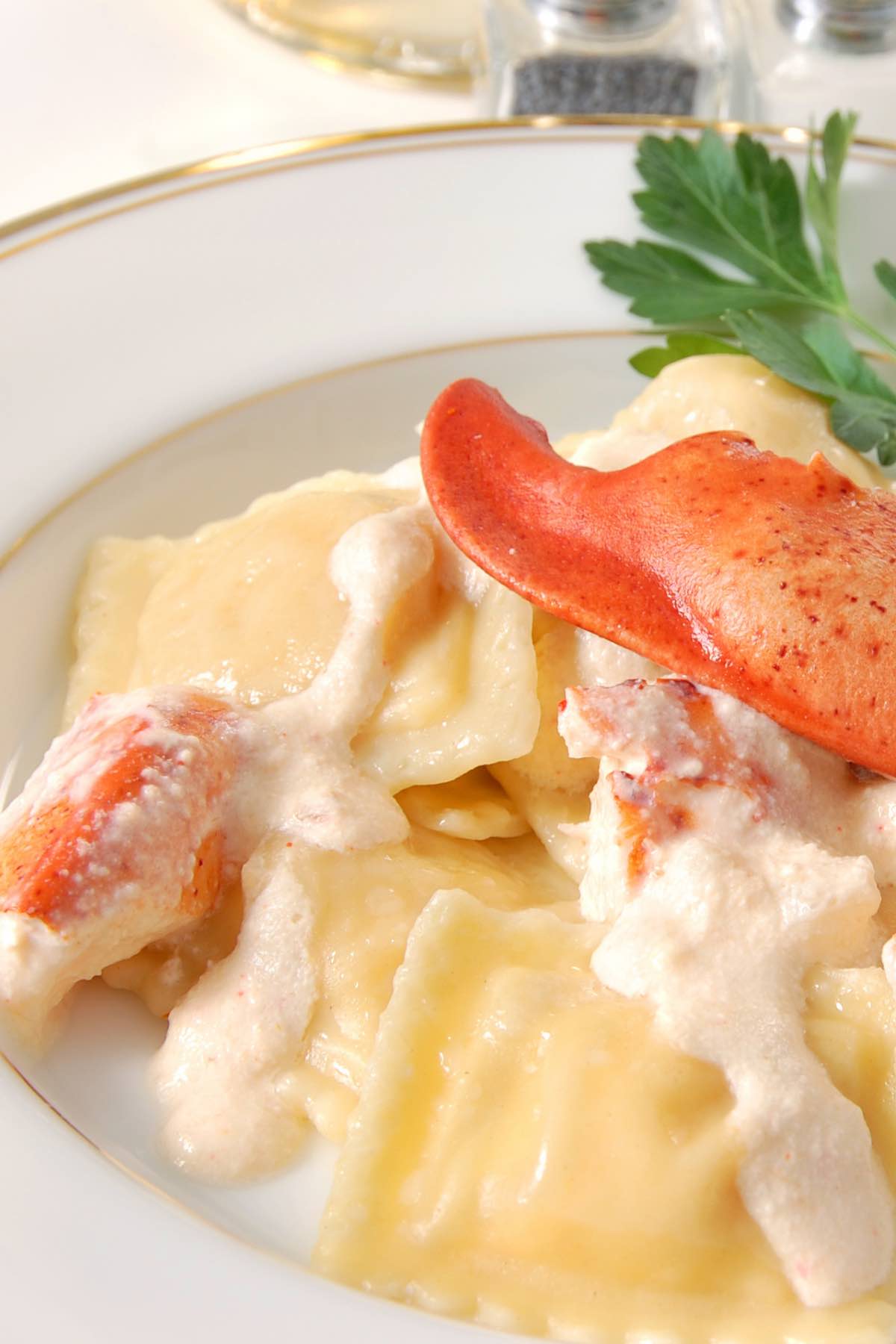 Closeup of lobster ravioli sauce made with butter, cream and white wine