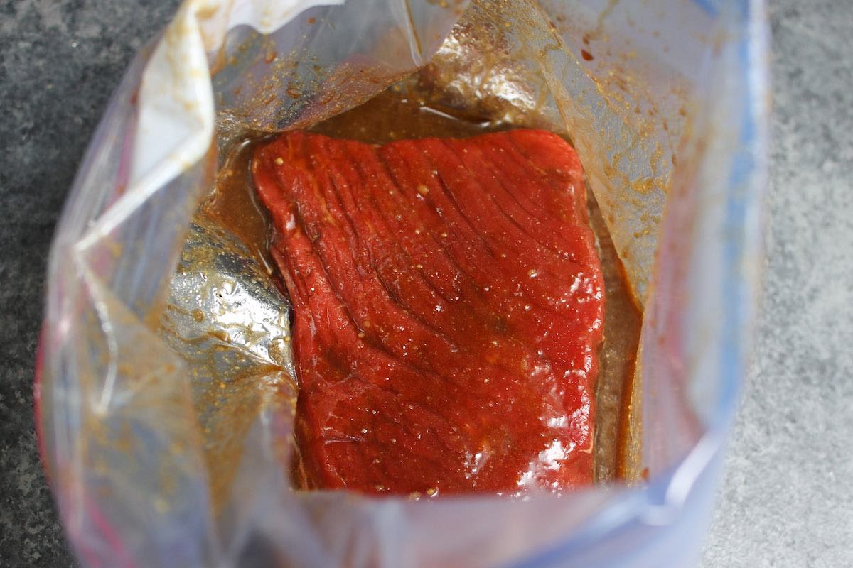 Marinating top round steak in a ziptop bag