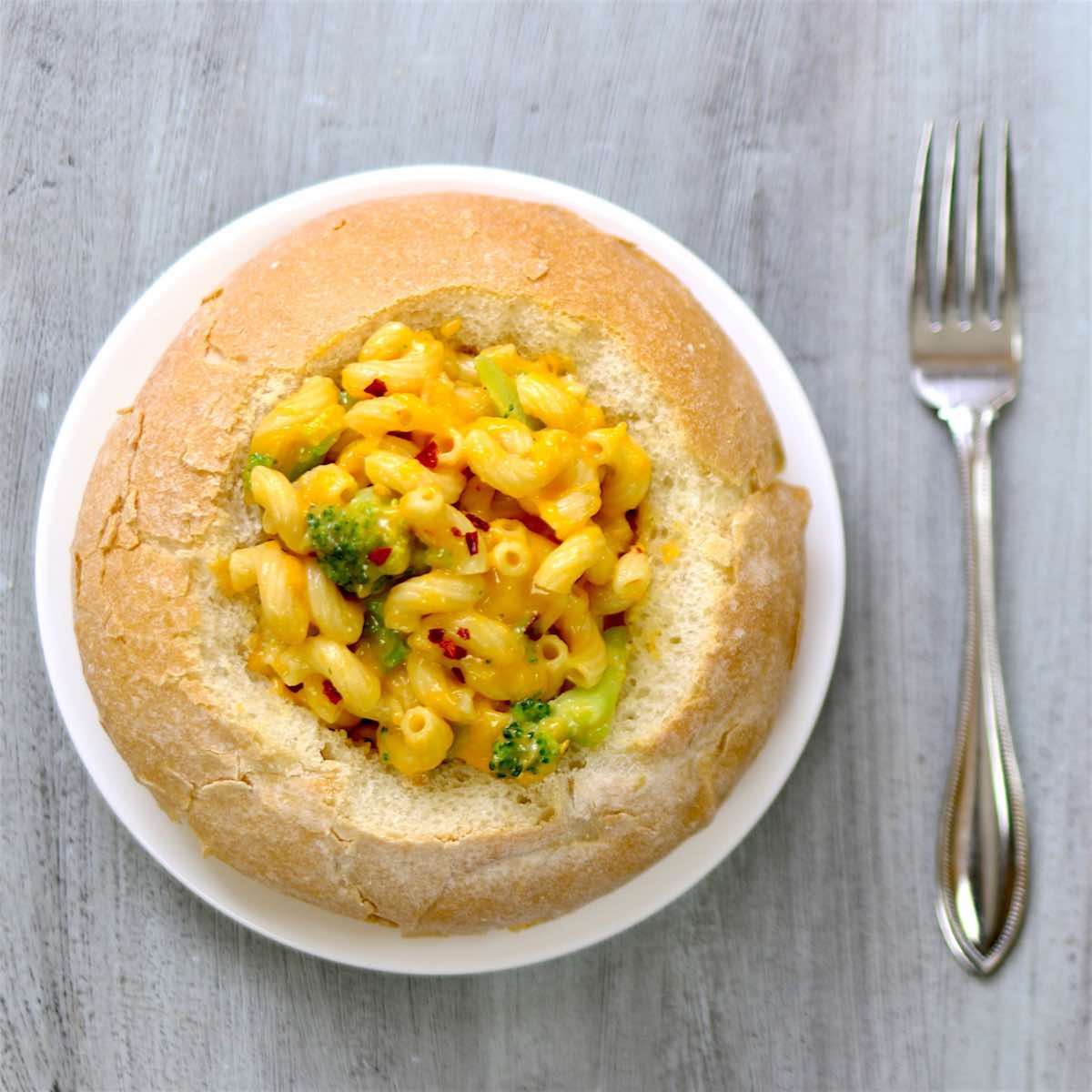 Overhead view of a DIY Panera mac and cheese bread bowl