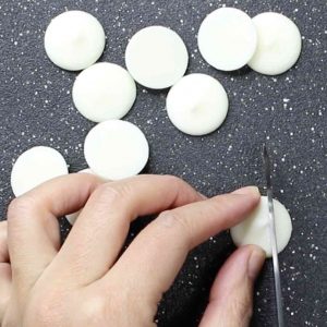Cutting white candy melts to make bunny ears