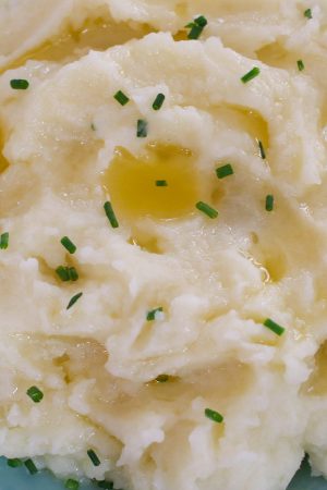 Closeup of microwave mashed potatoes showing the fluffy, creamy texture