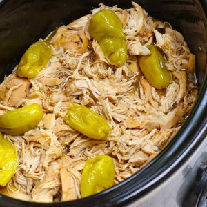 Shredded Mississippi Chicken in the slow cooker ready for serving