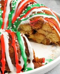 Delicious homemade Monkey Bread for the holidays with raisins, nuts and colorful icing for a festive look. There's nothing more comforting or satisfying for breakfast, brunch or a party.