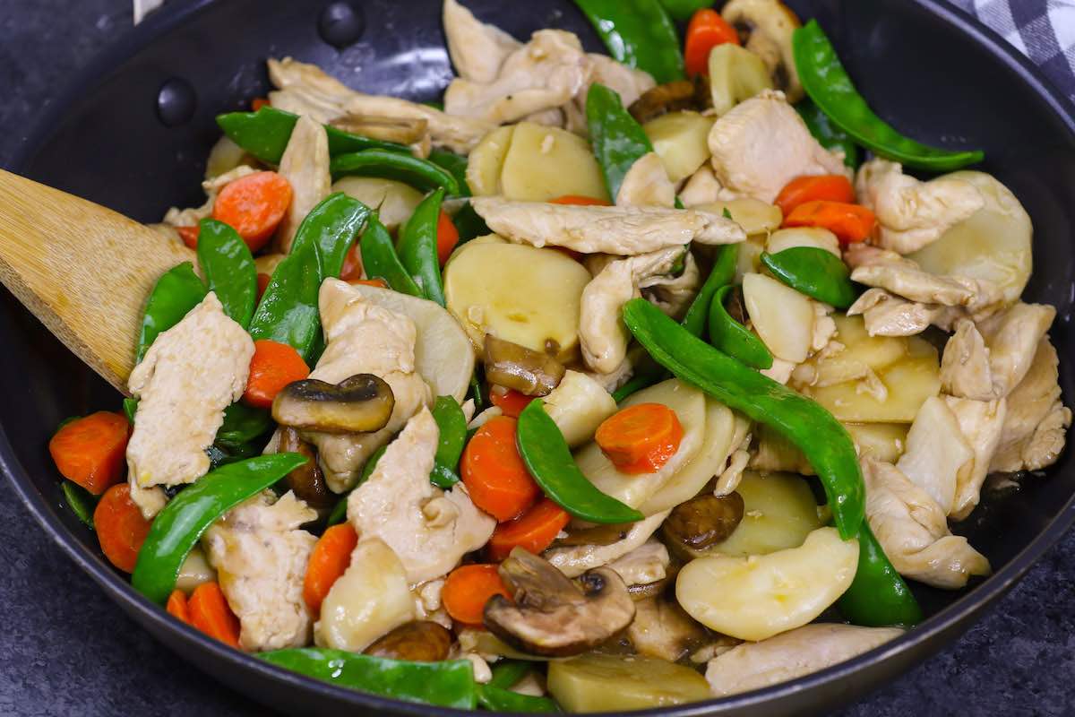 Add the chicken back to the pan and add the moo goo gai pan sauce.