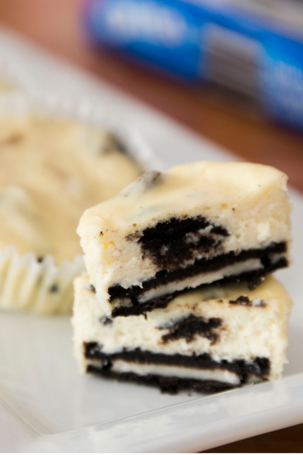 Cross section of an oreo cheesecake cupcake showing the fluffy texture