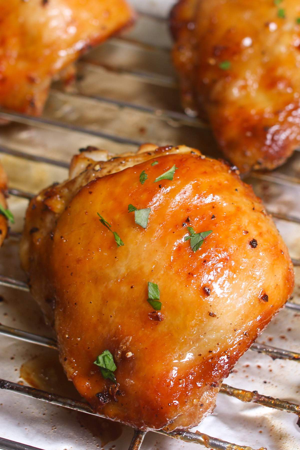 Oven Baked Chicken Thighs are crispy on the outside with tender dark meat on the inside. These baked chicken thighs are a quick and easy main dish with delicious soy brown sugar flavors. You only need a few minutes of prep for an easy one pan dinner!
