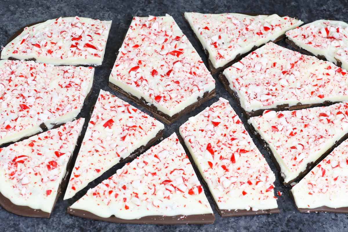 Closeup of peppermint bark that has been cleanly cut showing the two chocolate layers bonded together with no separation