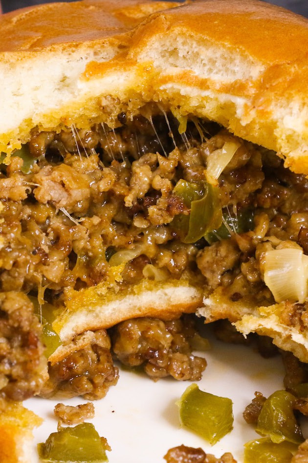 A bite shot of Philly cheese steak sloppy joes
