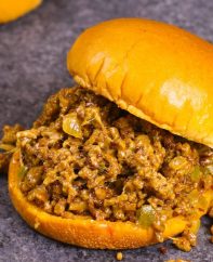 The easiest and most unbelievably delicious Philly Cheesesteak Sloppy Joes! And it’ll be on your dinner table in just 30 minutes. All you need is only a few simple ingredients: ground beef, beef broth, Worcestershire sauce, catchup, cornstarch and hamburger buns. Quick and easy dinner or lunch recipe. Video recipe. | Tipbuzz.com #SloppyJoes #PhillyCheeseSteak
