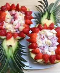 Strawberry Cheesecake Salad in Pineapple Boats is a fun dessert that's easy to make