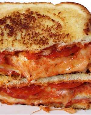 This Double Decker Pizza Sandwich recipe may be the best grilled cheese ever
