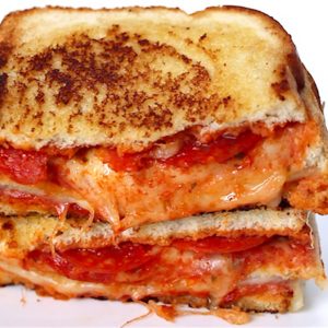 These easy Pizza Sandwiches combine your favorite bread with delicious pizza toppings such as pepperoni and mozzarella cheese, all cooked to golden cheesy perfection. This recipe will take your love for grilled cheese to a new level!