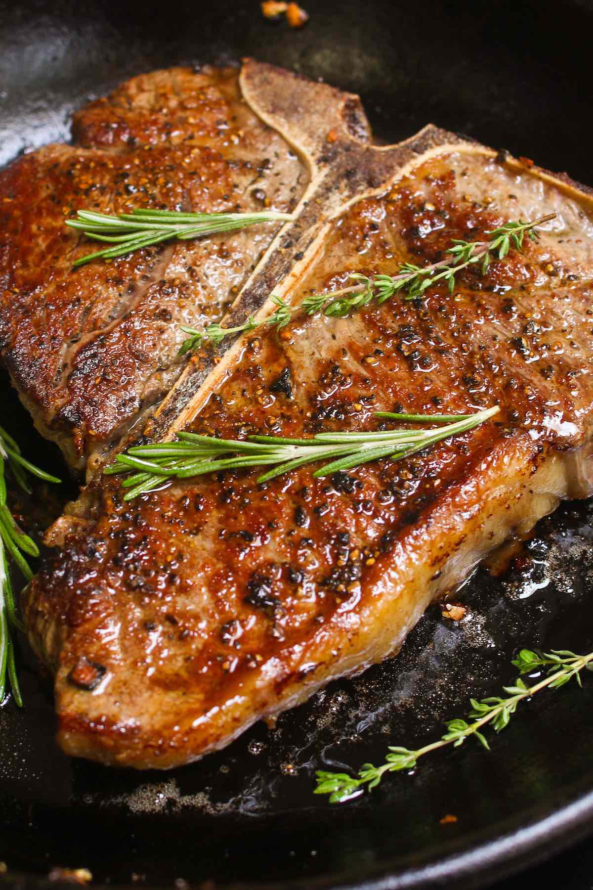 A Porterhouse steak recipe that's been pan seared at high temperature and finished in the oven producing a beautiful golden crust