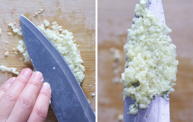 How to Puree Garlic with a knife on a cutting board with salt when making garlic butter