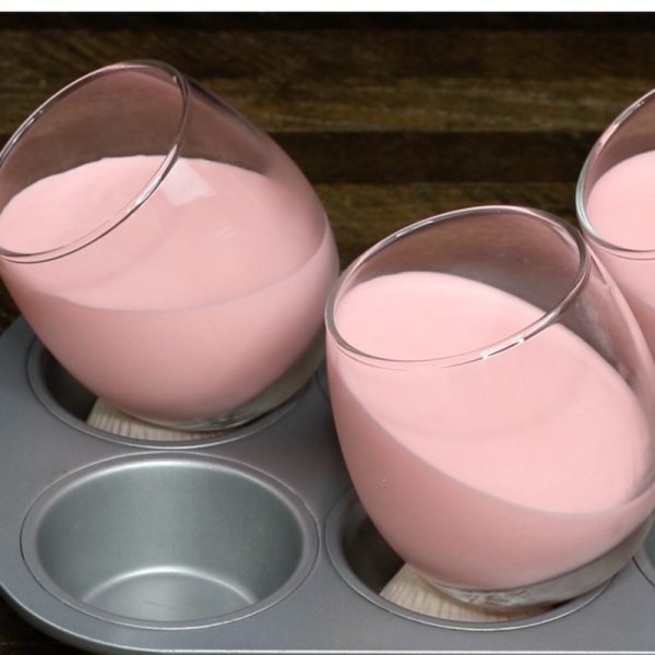 Raspberry Chocolate Mousse - this photo shows stemless wine glasses with a raspberry mousse layer