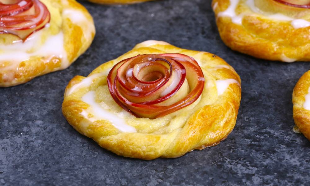 This Rose Apple Danish has a beautiful apple rose in the middle surrounded by flaky pasty and topped with homemade icing