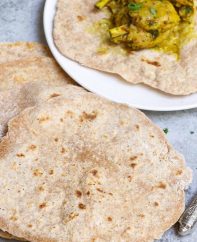 Roti flatbreads with chicken curry