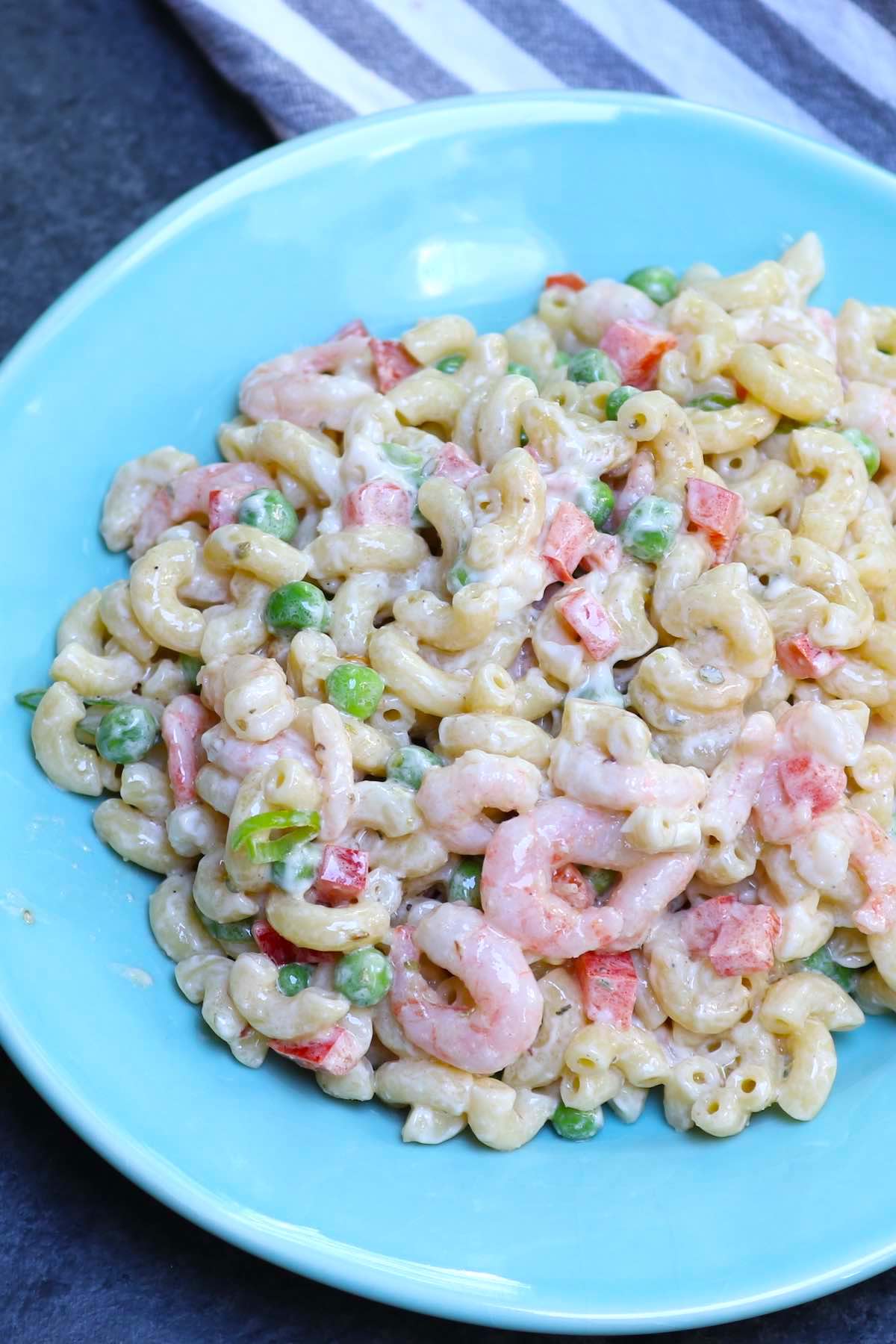 Shrimp pasta salad on a serving plate