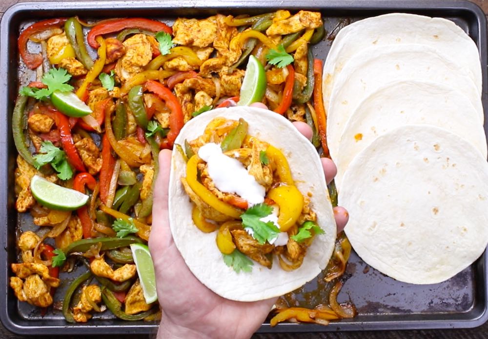 Assembling fajitas off a sheet pan