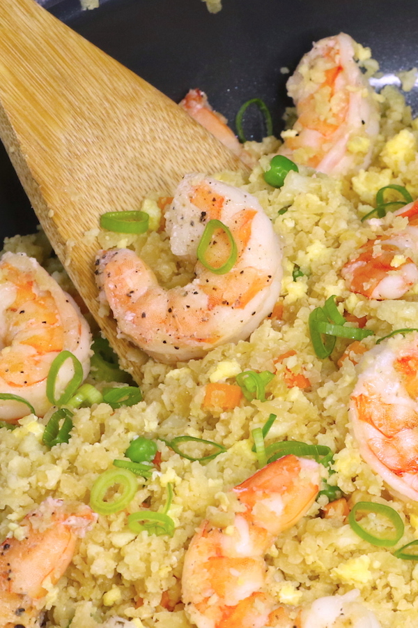 Shrimp cauliflower fried rice in a skillet before serving