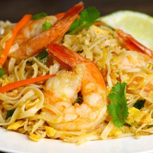 Shrimp Pad Thai is loaded with sweet, sour and spicy shrimp, mixed with rice noodles and vegetables. It’s so simple and easy to make. Try it once and you won’t want to go back to takeout! It comes together in only 20 minutes.