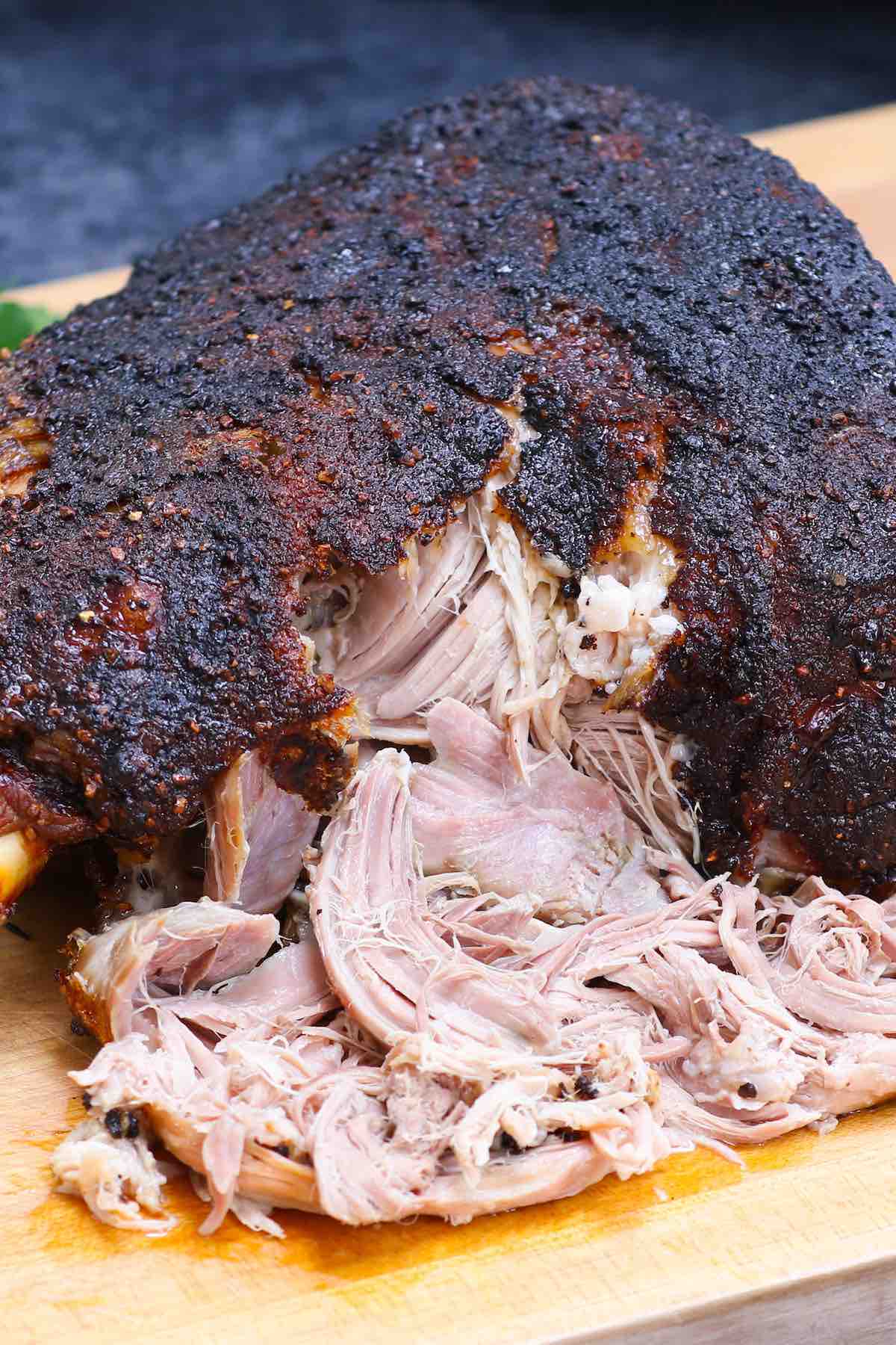 A large pork shoulder smoked to perfection with beautiful crispy bark on the outside and shredded pulled pork on the inside