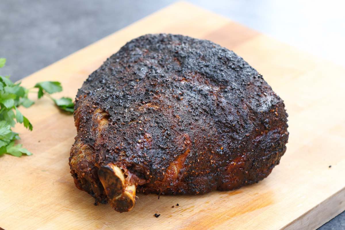 The bark on the outside of a smoked pork shoulder