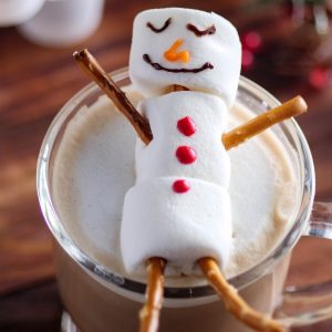 These adorable Snowman Mocha Lattes are a festive hot beverage to serve guests during the holiday season