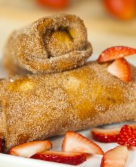 Strawberry Cheesecake Chimichangas are a Tex Mex dessert that's crispy on the outside and creamy on the inside!