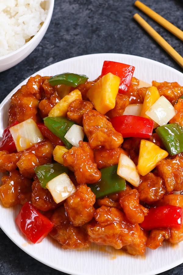 Crispy outside and tender on the inside, this Sweet and Sour Chicken recipe also features the most luxurious sweet and sour sauce that’s so irresistible. It’s one of my favorite Chinese chicken recipes 