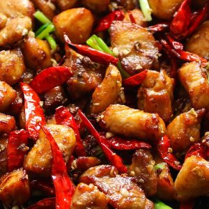 This Szechuan Chicken is the classic Chinese dish made with chicken thighs, Szechuan peppercorns, dried chilis, garlic, ginger and green onions. It makes a fabulous dinner idea for anyone who loves spicy food!