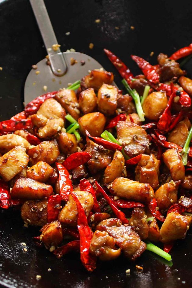 Cooked Szechuan chicken in a wok.