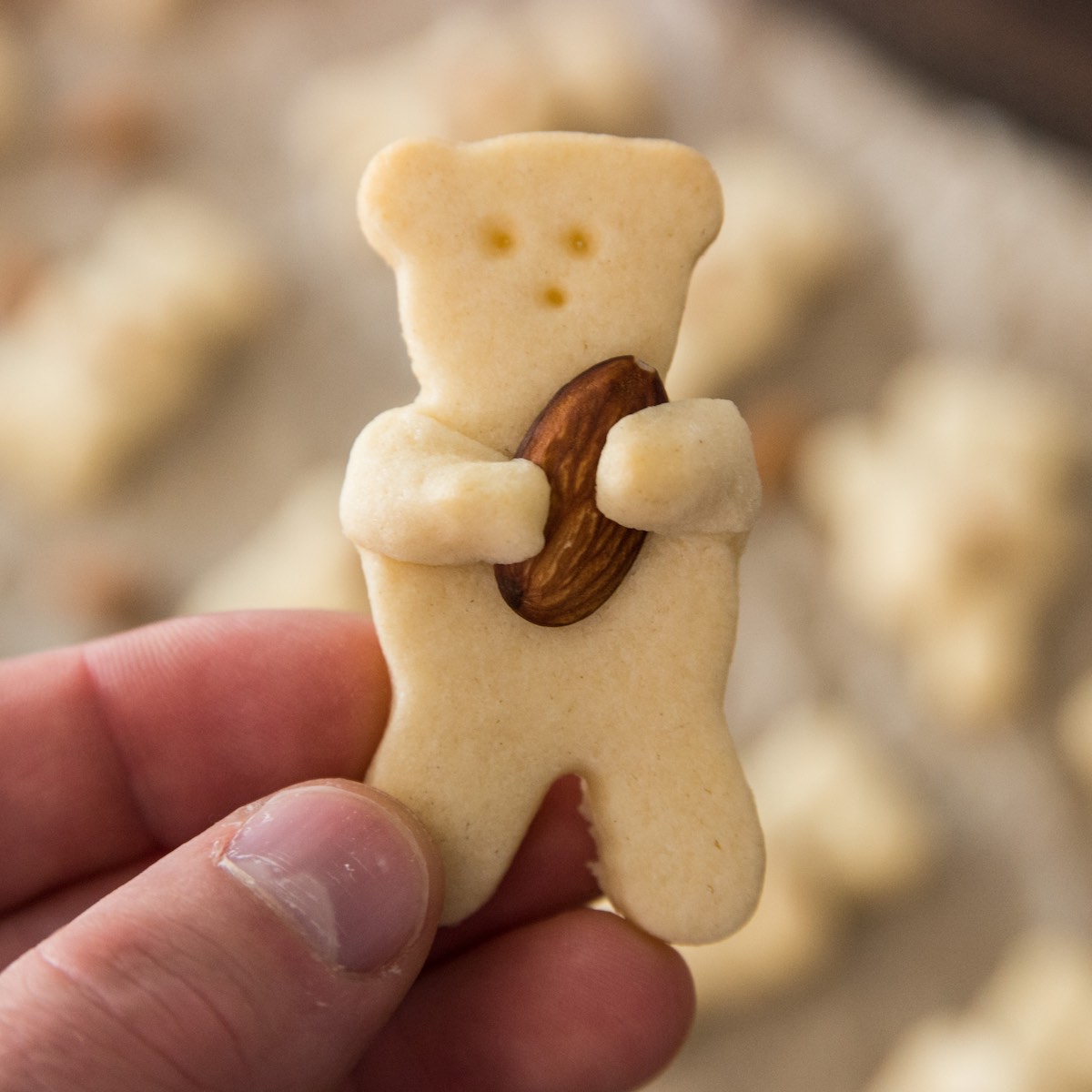Closeup of a bite-size Teddy Bear Cookie made with sugar cookie dough