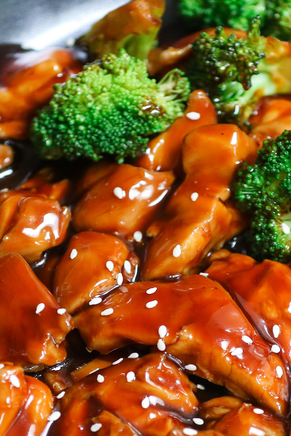 Teriyaki Chicken glazed with teriyaki sauce glaze and served with fresh broccoli and garnished with sesame seeds