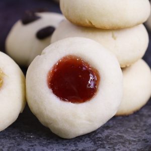 These classic Thumbprint Cookies are the combination of soft and buttery shortbread cookies and your favorite fillings. It’s the perfect Christmas treat!