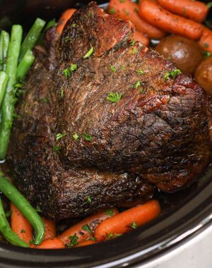 London broil with carrots, potatoes and green beans in the crock pot