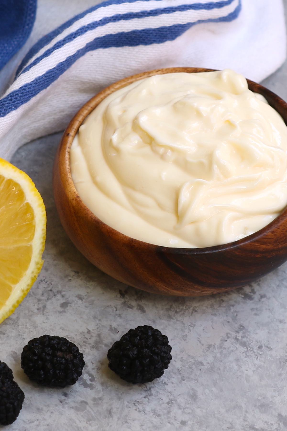 Truffle Aioli in a small bowl for dipping with whole black truffles on the side