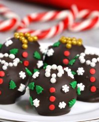 Ugly Christmas Sweater Oreo Truffles are an adorable holiday treat or gift idea made with oreo cookies, cream cheese and semisweet chocolate for delicious bites of awesomeness