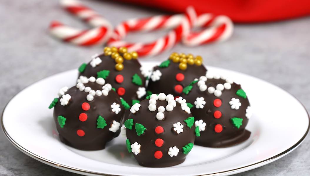 Ugly Christmas Sweater Oreo Truffles are an adorable holiday treat or gift idea made with oreo cookies, cream cheese and semisweet chocolate for delicious bites of awesomeness