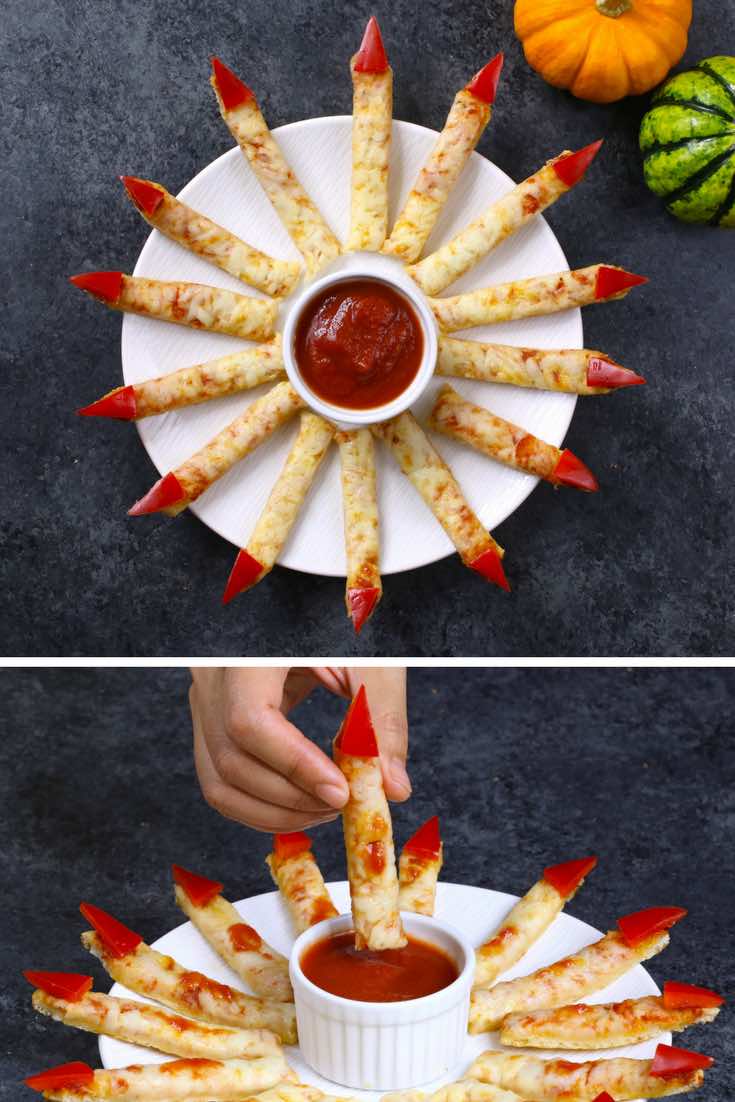 Homemade pizza fingers on a serving plate for a fun Halloween appetizer