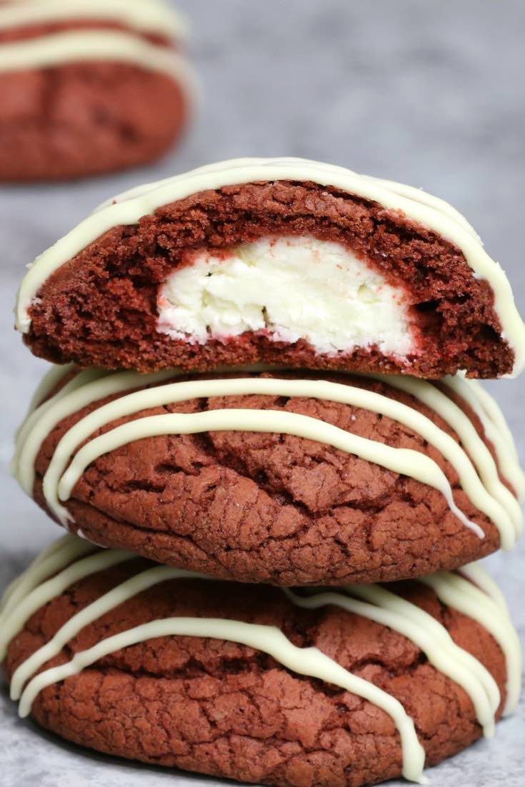 Red velvet cake mix cookies with a creamy cheesecake filling and white chocolate drizzle make a gorgeous sweet treat