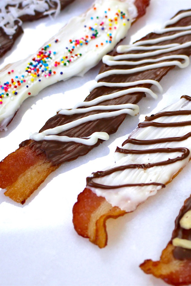 Closeup of chocolate bacon with different white chocolate and milk chocolate designs