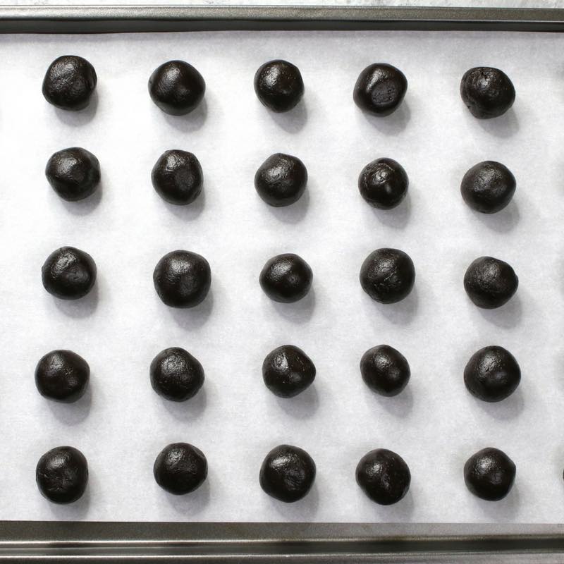 4 Ingredient Oreo Truffles - this photo shows oreo balls arranged on a baking sheet to chill before being made into oreo truffles